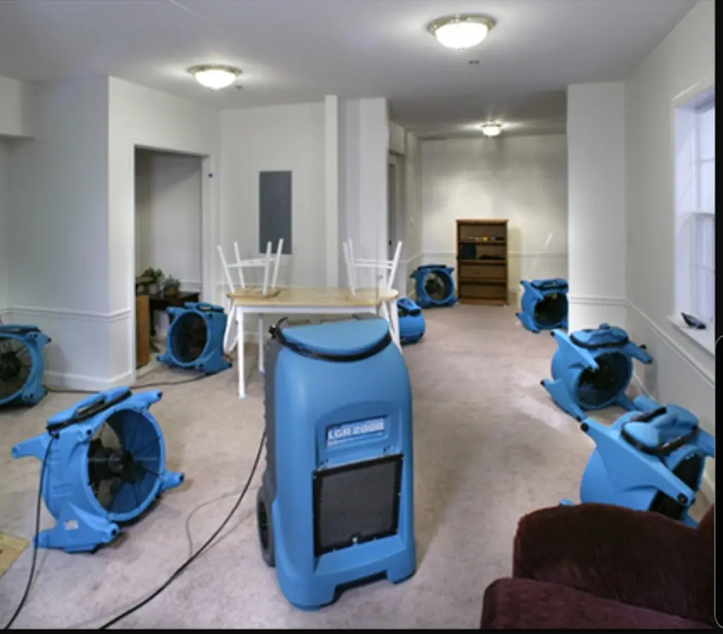 Air movers and dehumidifier setup for Water Damage Restoration in North Syracuse