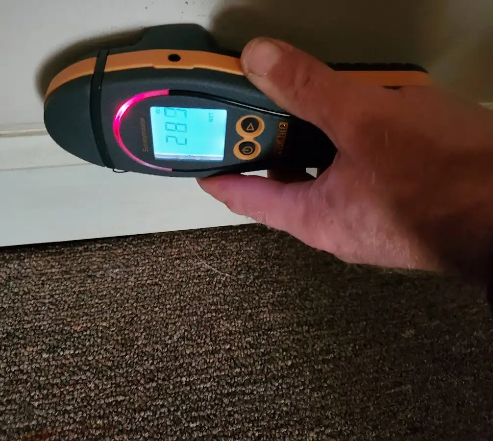 Moisture detection at baseboard during Burst Pipe Cleanup in North Syracuse